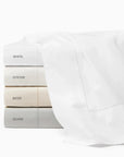 Luxor flat sheet white, oyster, beige and silver stacked and labeled