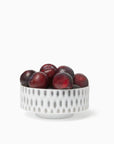 Alveare bowl with fruit on a white background