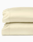 Ariel Parchment pillowcases stacked