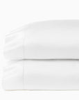 Ariel white pillowcases stacked