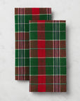 Masseria emerald/red dinner napkins stacked and folded