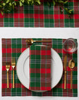 Masseria table setting in Emerald/Red including the napkin, placemats and table runner