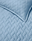 Palatino quilt and sham in sea