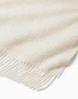 Terranova ivory throw blanket corner details