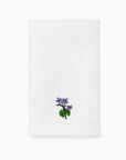 Fiorenza February violet flower guest towel folded
