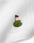 Golf cocktail napkins with the putting green, flag and hole.