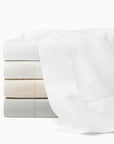 Luxor flat sheet white, oyster, beige and silver stacked.