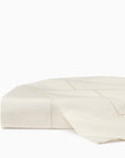 Luxor beige flat sheet folded.