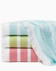 Merlata beach blankets in clearwater, kiwi & coral stacked