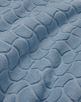 Close-up of textured oasi sea bath linens