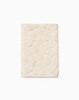Oasi ivory hand towel folded