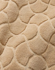 Close-up of textured sand oasi tub mat fabric