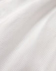 Close up details of the Perrio bone fabric