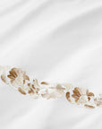 Tralcio white/sand bed linens close up