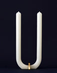 U Candle by Glaze Studio is a hand-poured, dual burning candle made of 100% white beeswax, sold by SFERRA.