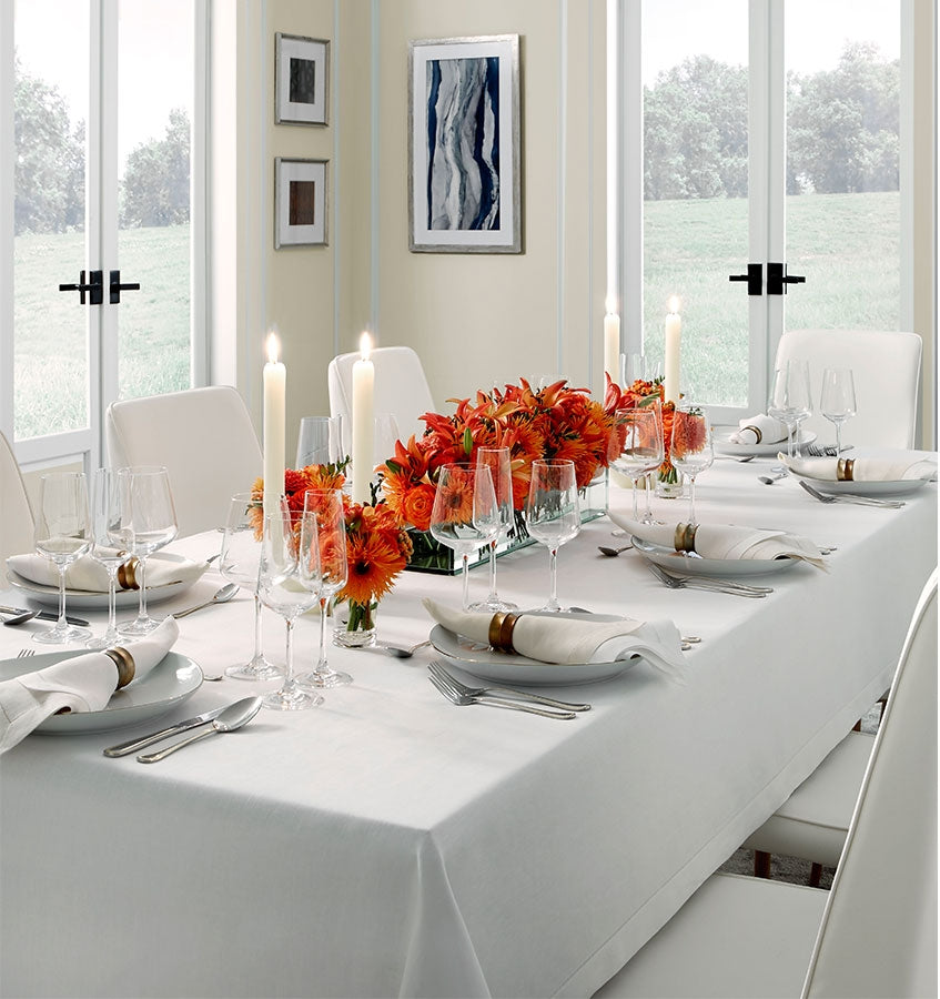 A spring tablescape set with SFERRA fine linen classico table collection.