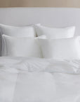 A hypoallergenic microfiber fills SFERRA's Arcadia down alternative duvet.