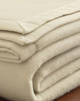 The luxury SFERRA Savoy Blanket, a pure cashmere ivory blanket.