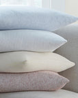 Terzo pillows and throws feature a classic basket weave pattern in soft, versatile colors.