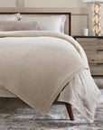 The SFERRA Talida Blanket, a traditional waffle weave with two tonal shades. It is woven with the finest Merino wool.