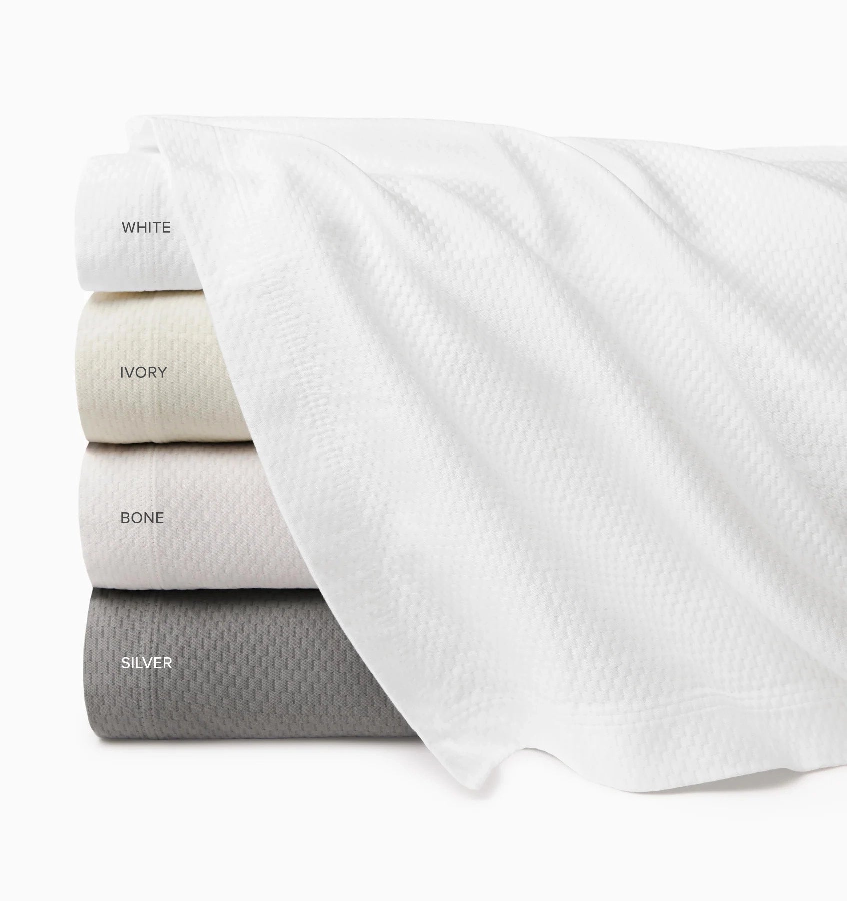Perrio coverlet stack top to bottom: white, ivory, bone, silver labeled