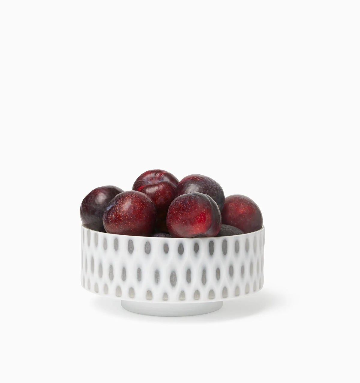 Alveare bowl with fruit on a white background