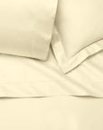 Ariel parchment flat sheet, sham and pillowcase vignette.