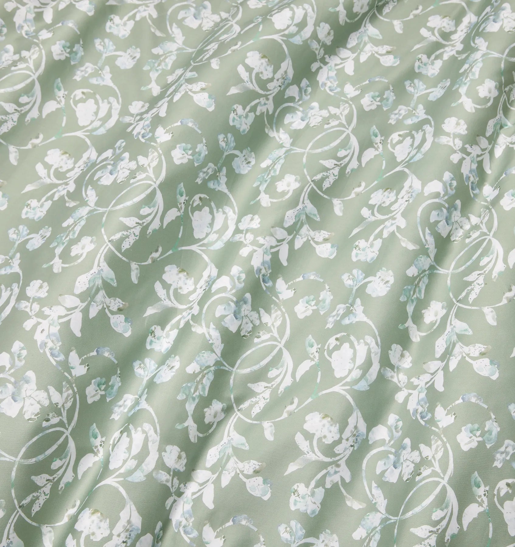 Fronda sage bed linens close up