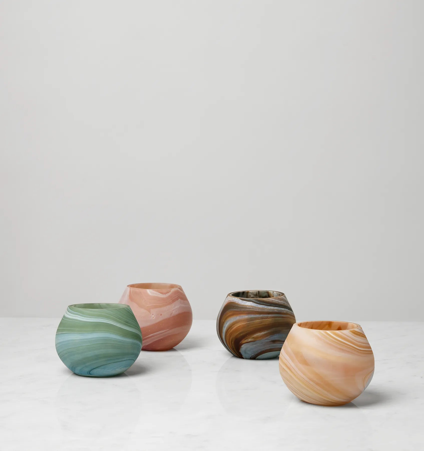Giove votive candle holders in all four colors