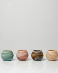 Giove votive holder in clover, paprika, bark and almond