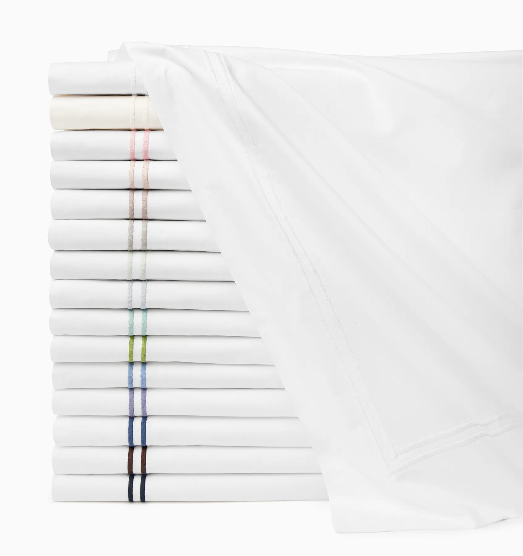 Grande hotel flat sheets folded and stacked in every color