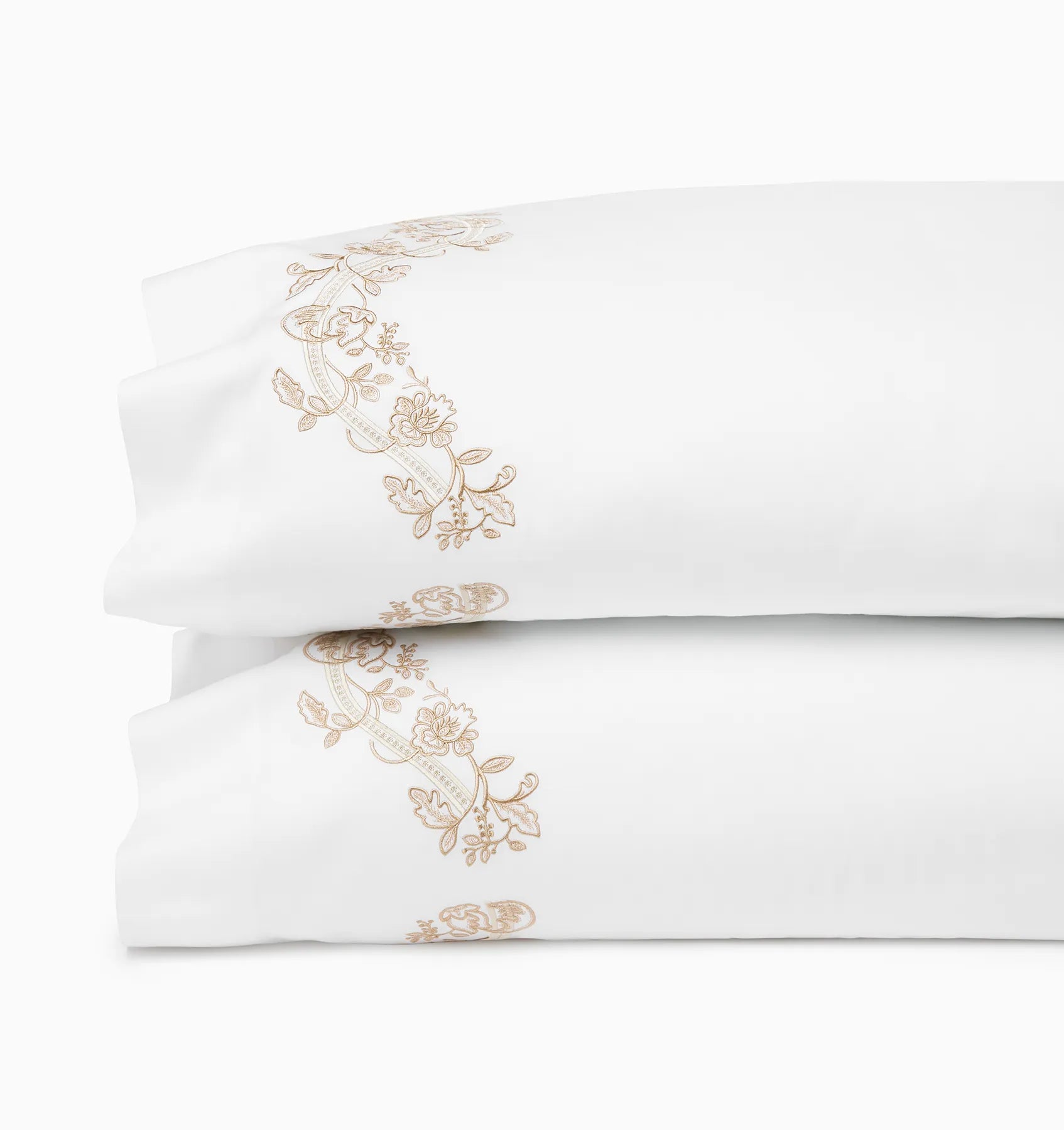 Isabella ivory/sand pillowcase pair stacked.