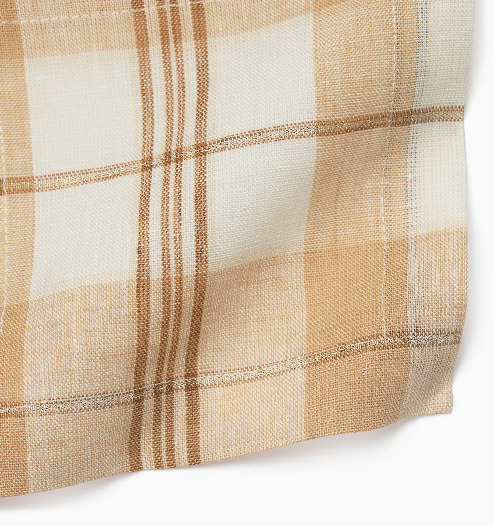 Masseria table linen corner details in almond/oyster stacked