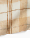 Masseria table linen corner details in almond/oyster stacked