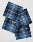 Cadet/navy Masseria plaid cocktail napkins stacked