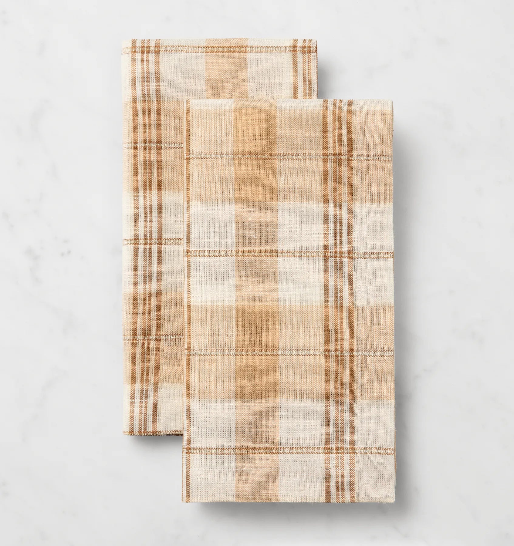 Masseria almond/oyster dinner napkins stacked and folded