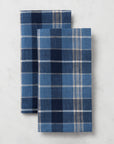 Masseria cadet/navy dinner napkins stacked and folded