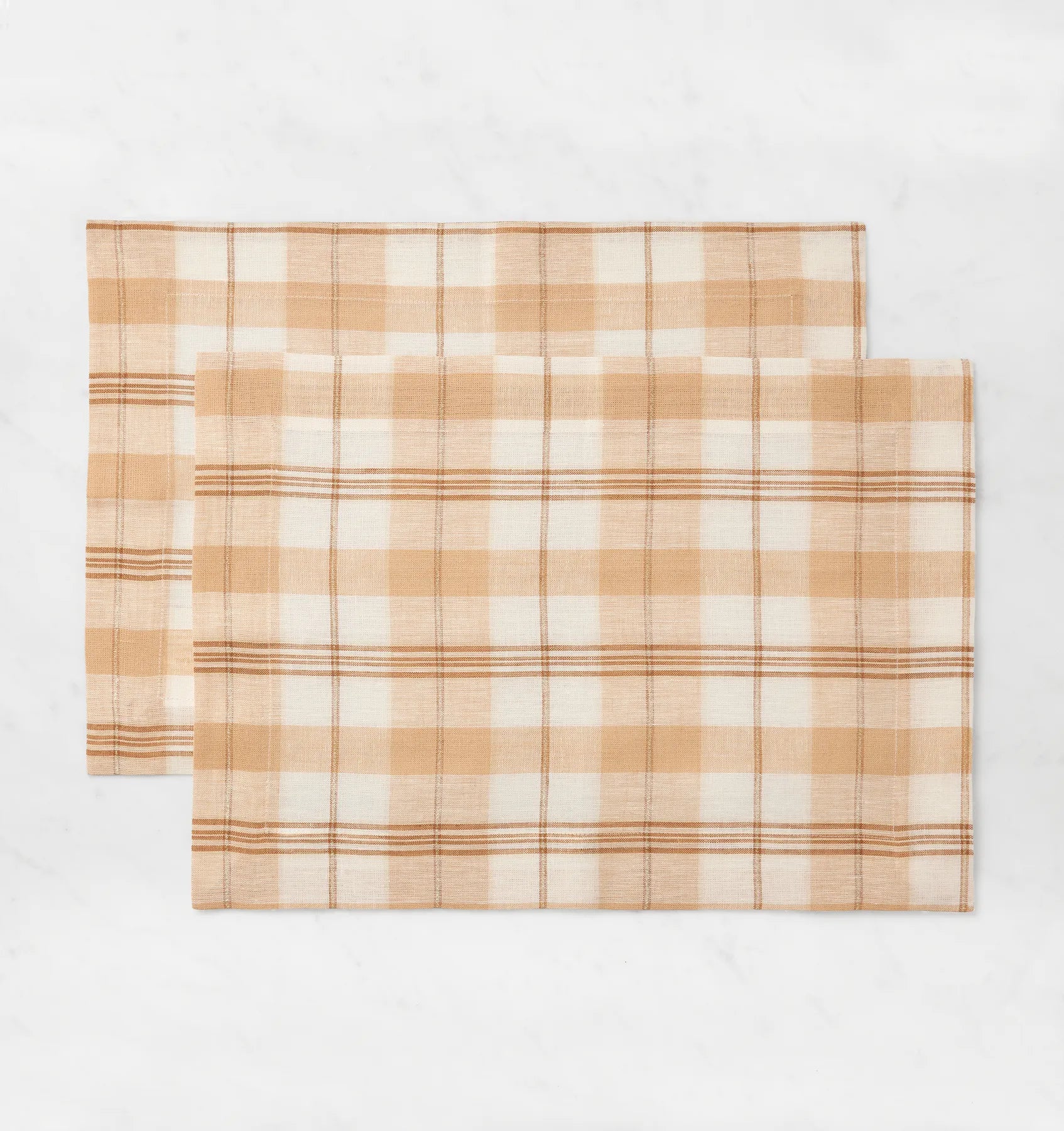 Masseria placemats in almond/oyster stacked