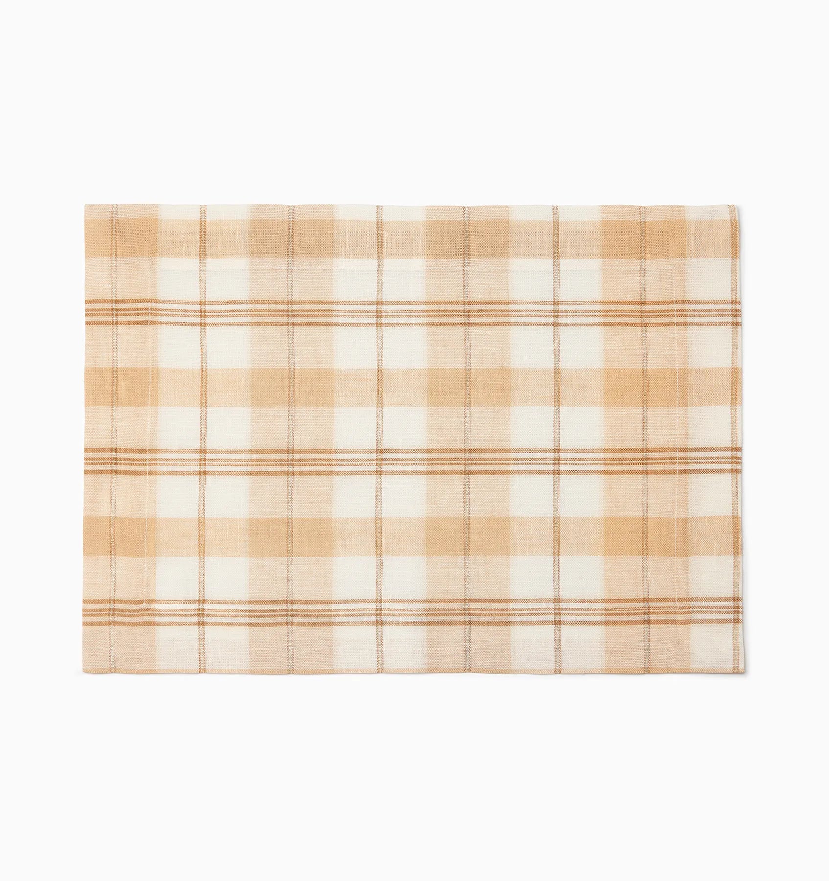 Masseria placemat in almond/oyster on a white background