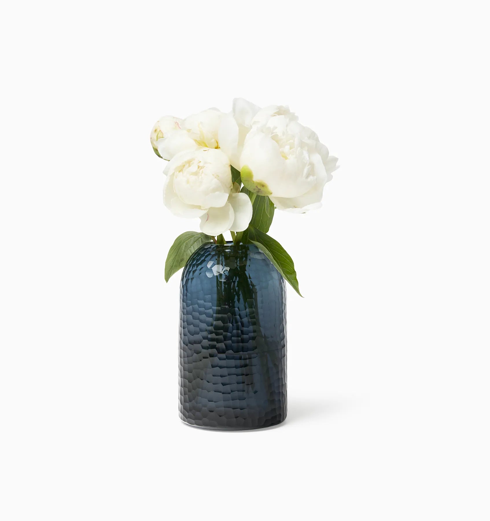 Oculus glass vase in smoke with white flowers