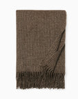 Terranova khaki throw blanket on a white background