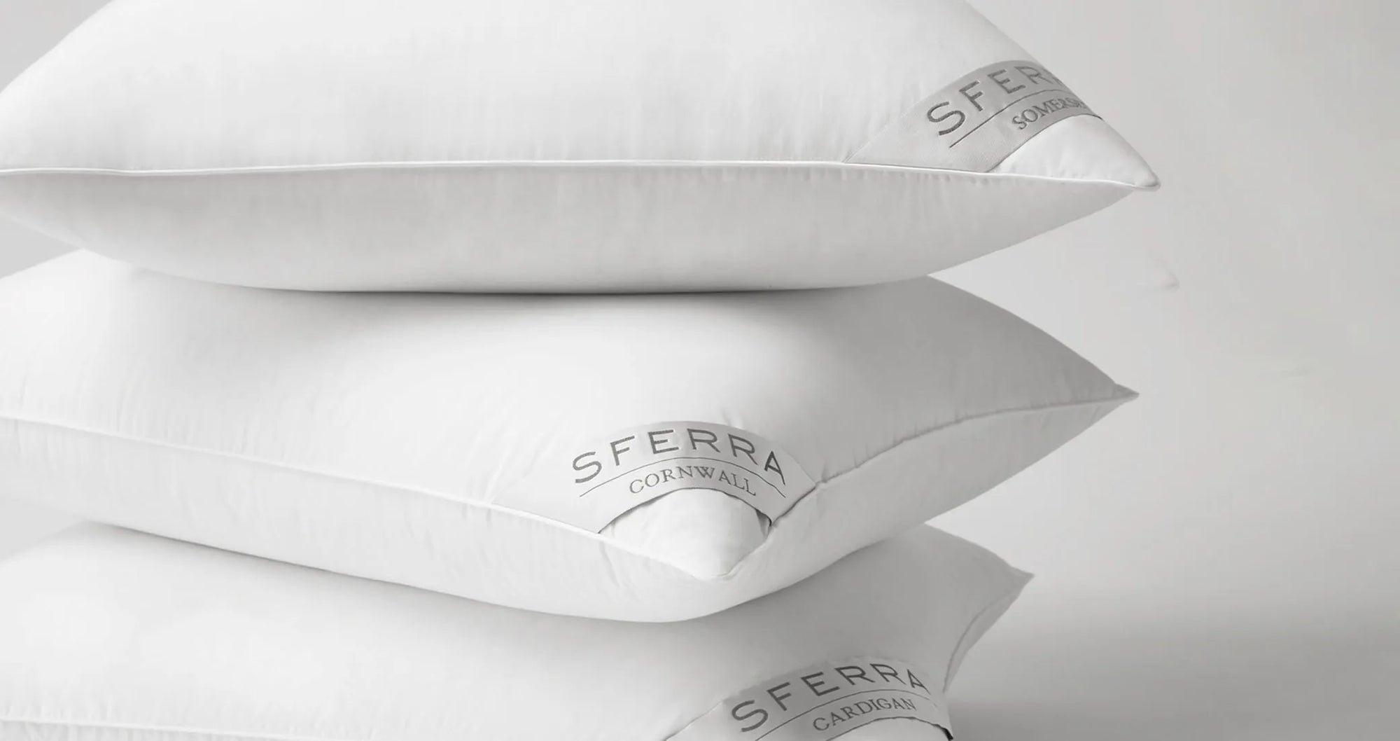 Mixed stack of down pillows somerset, cornwall and cardigan