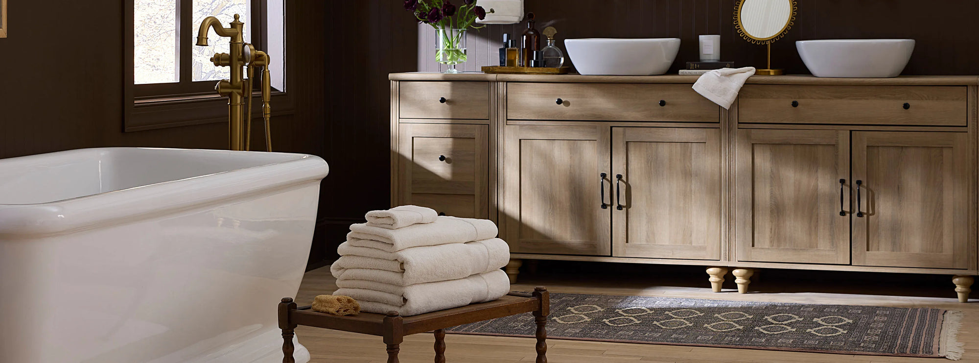 Bello Nuovo ivory bath linens stacked 