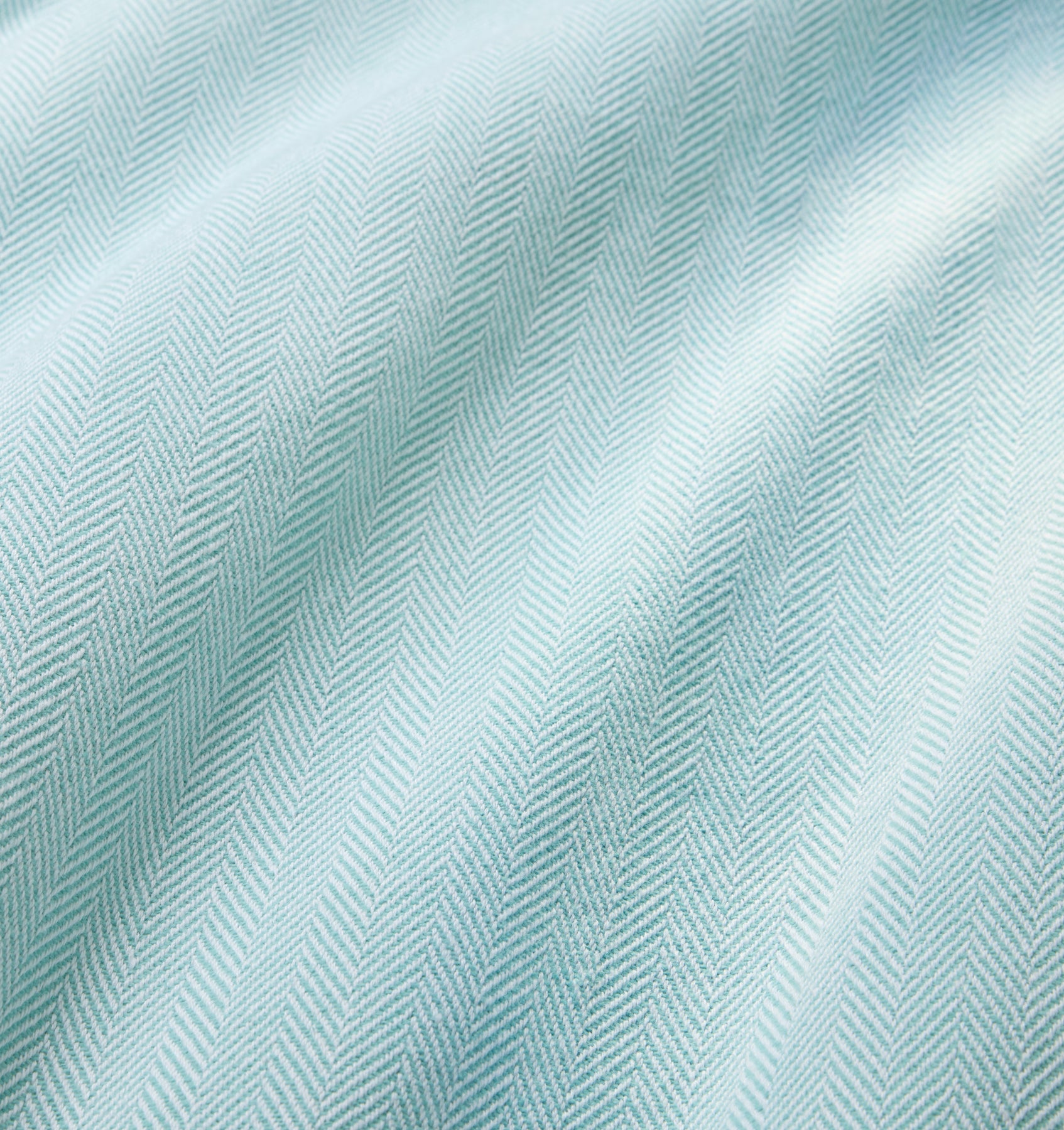Close up Celine throw fabric in white/aqua