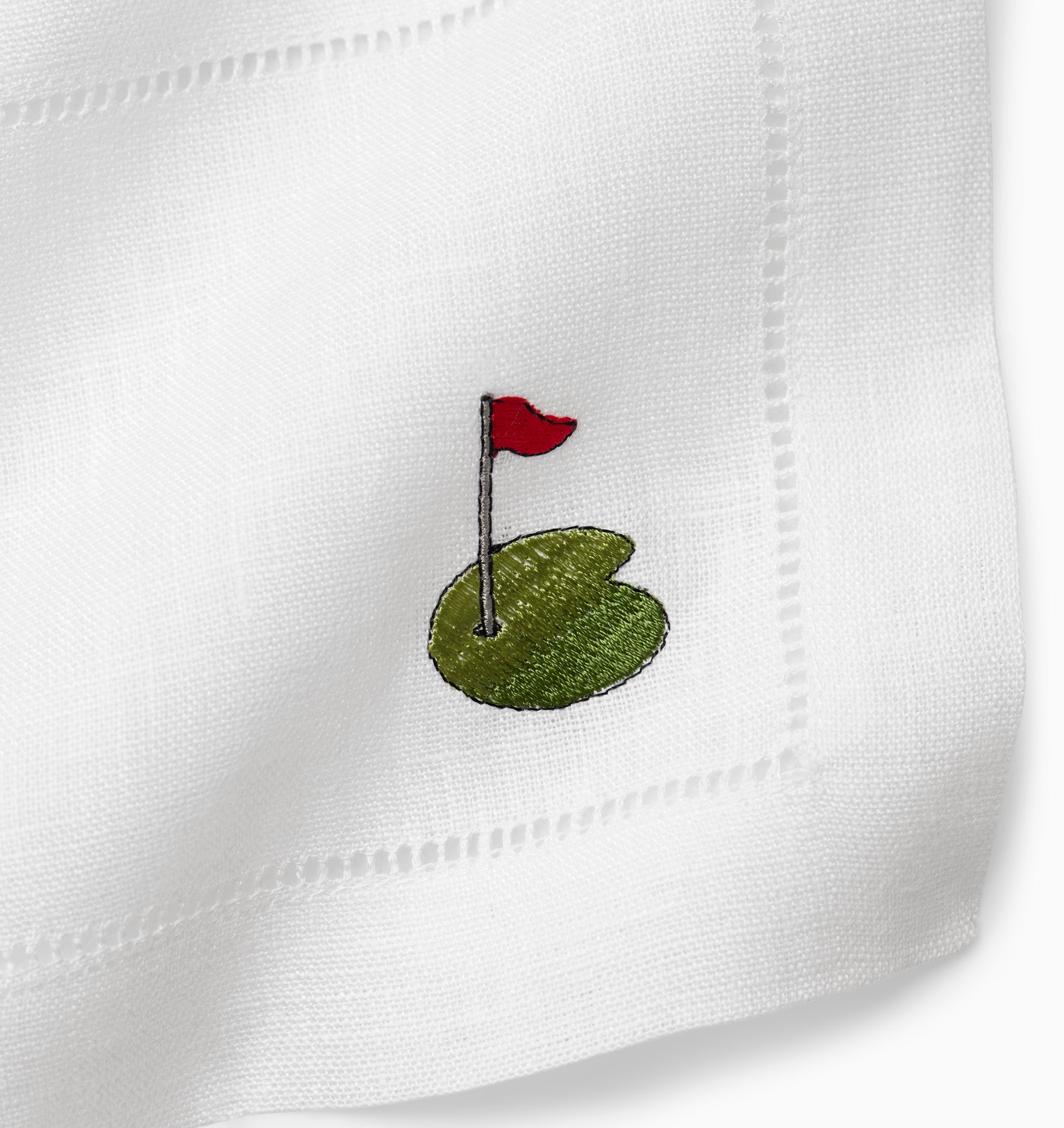 Golf cocktail napkins with the putting green, flag and hole. 
