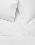 Luxor white flat sheet, pillowcase and sham vignette in white