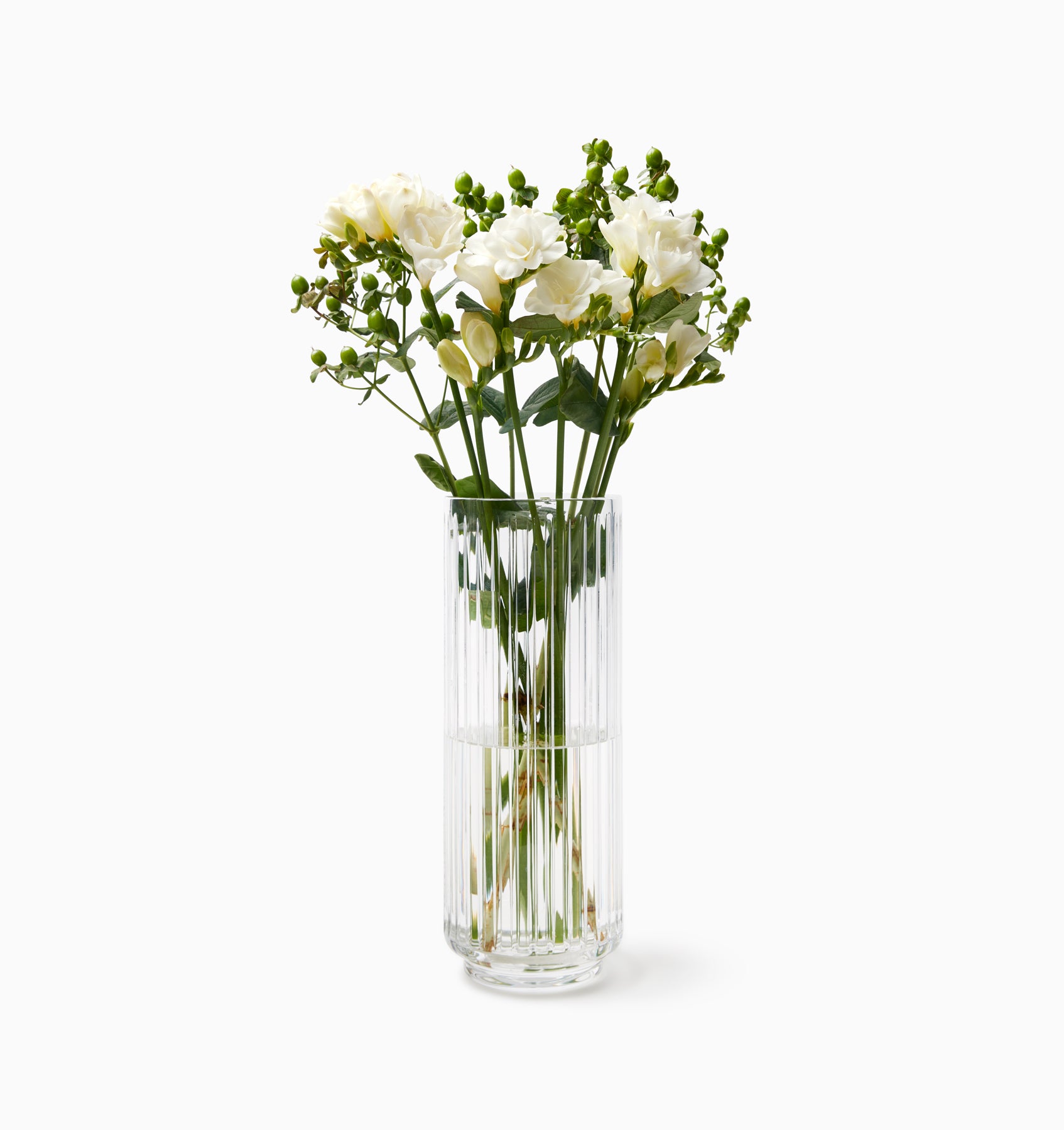 Minerva clear crystal vase with white flowers 