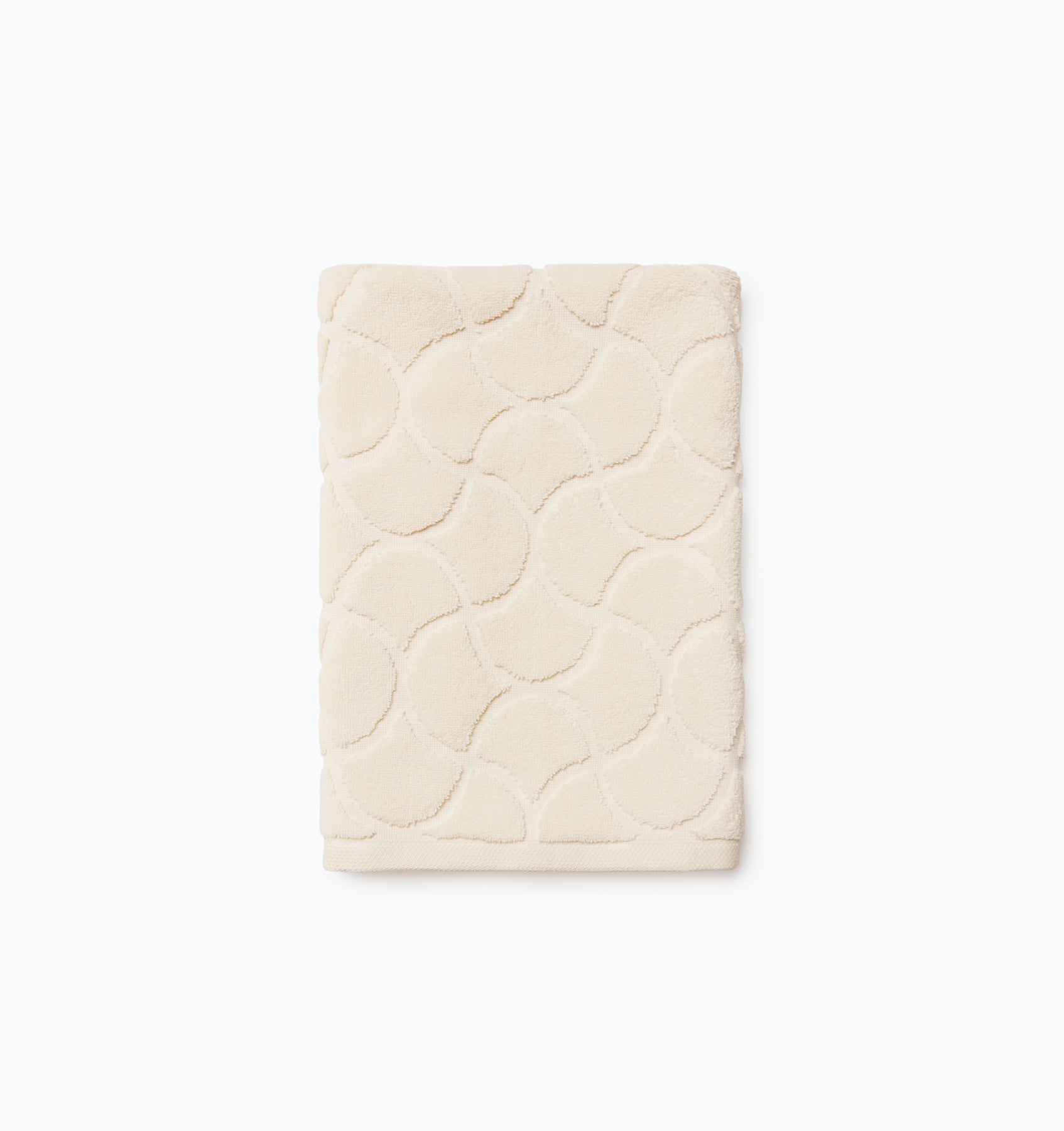 Oasi ivory hand towel folded