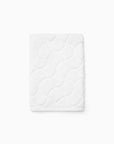 Oasi white hand towel folded