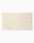 Ivory Oasi tub mat flat lay